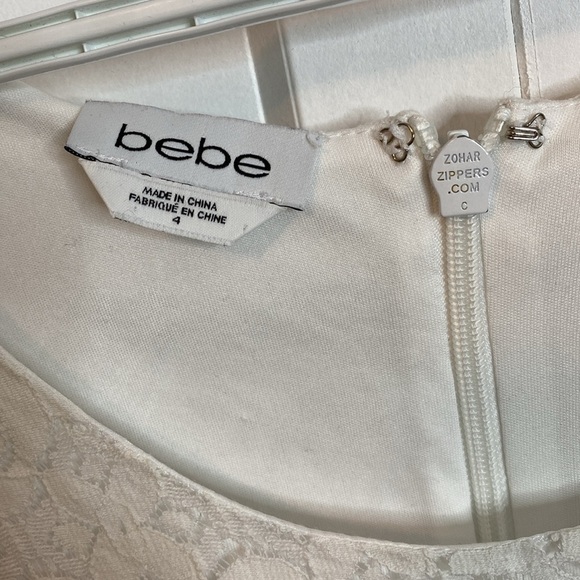 BEBE | Sleeveless Elegant White Lace Peplum Dress - US4 - Perfect for bridal - Picture 2 of 7